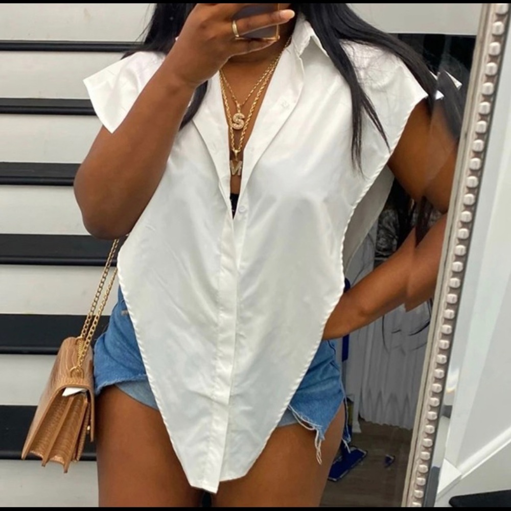 White sleeveless button down shirt